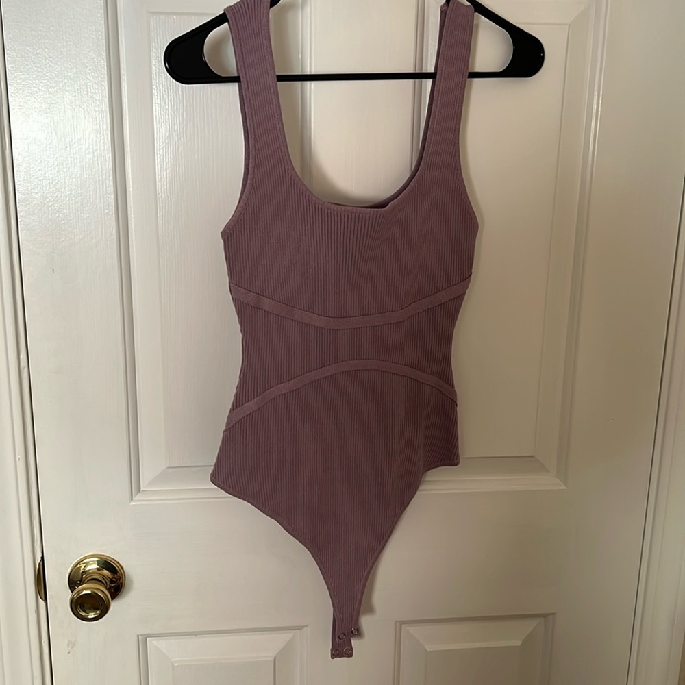 purple body suit